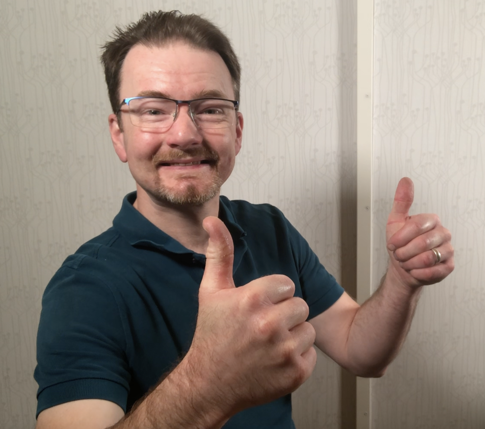 ME closeup thumbs-up
